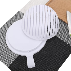 A salad cutter bowl is a kitchen tool designed to simplify the process of chopping and preparing fresh salads. It typically consists of a bowl with slots or ridges and a top cover with integrated cutting blades